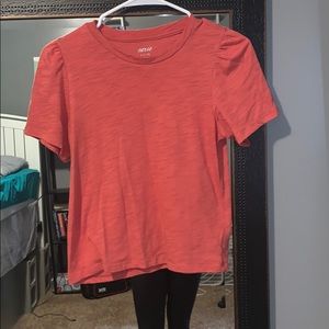 An orange Aerie T-shirt.